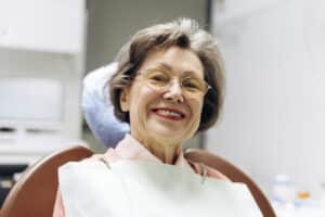 Senior woman smiling during dental checkup